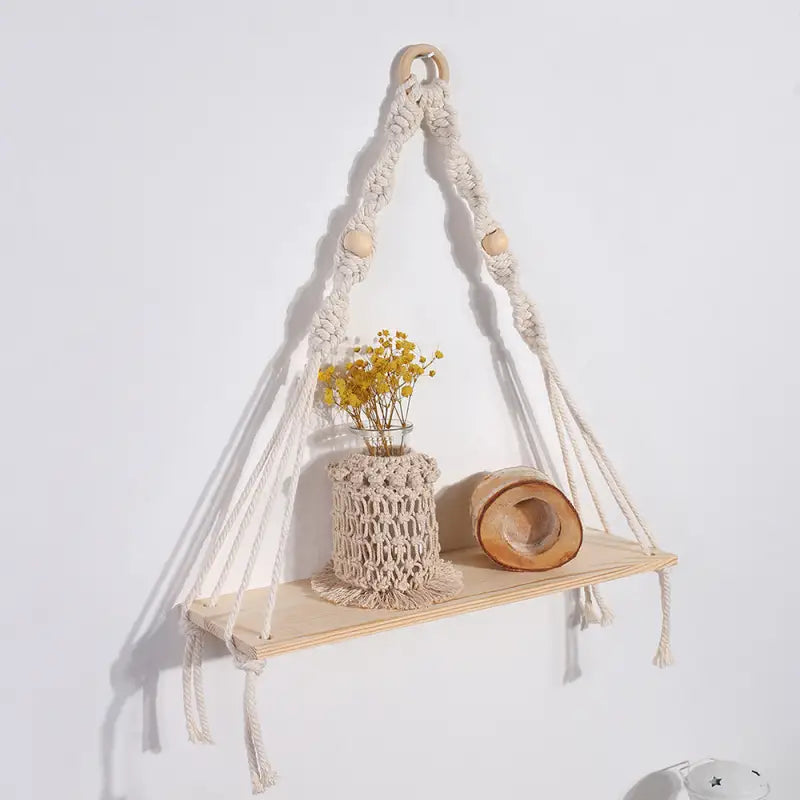 Give your home a touch of handcrafted artistry and a bohemian vibe with this one-of-a-kind Macrame Hand Woven Cotton Rope Tapestry Plant Holder.